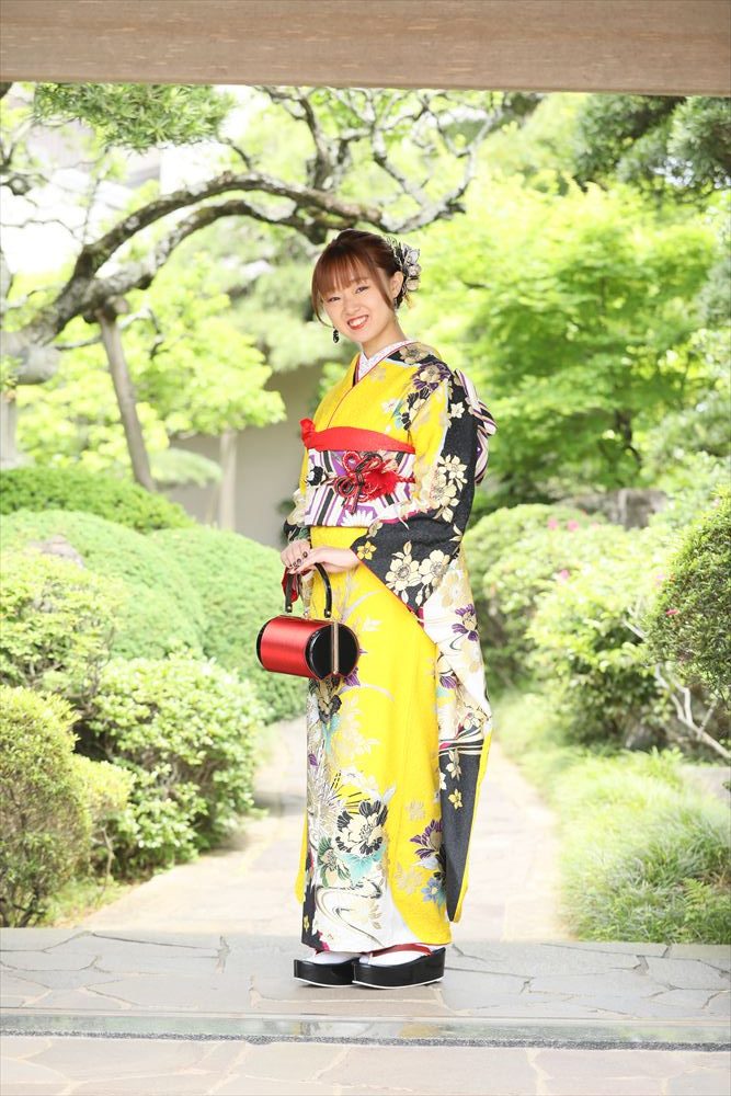 黄色　黒　花